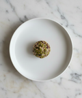 Pistachio Energy Ball - White Plate Marble Background